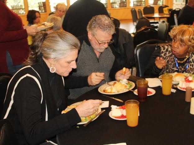 2025 Becoming Project event — attendees dining together
