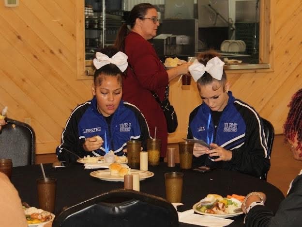 2025 Becoming Project — DHS cheerleaders at the event
