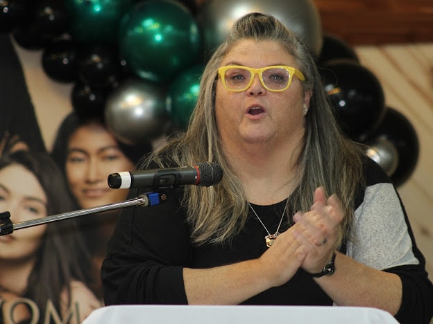 2025 Becoming Project — speaker at microphone with balloons