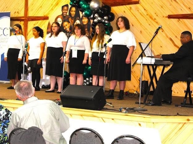 2025 Becoming Project — youth choir performing on stage