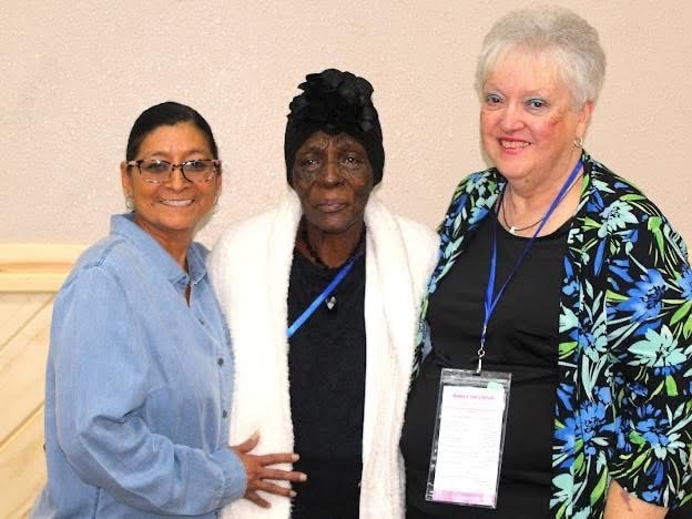 2025 Becoming Project — three women smiling together at retreat